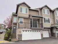 Building Photo - Enjoy this 3 Bedroom 2.5 Bathroom End Townhome ~ 2 Car Garage + Washer & Dryer! Great Cedar Mill ...