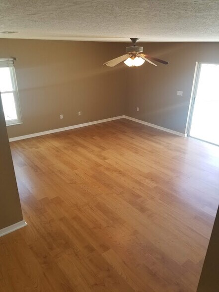 downstairs family room with sliders to outdoors - 2908 Shannon Cir