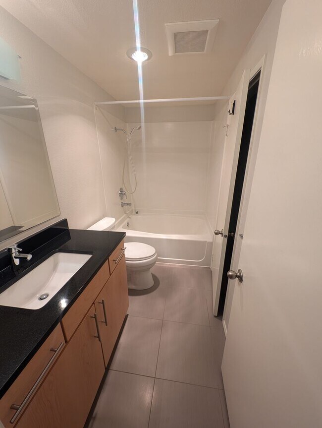 Building Photo - Capitol Hill Condo Available in June - Two Bedroom, High Floor Unit w/ A/C