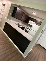 Renovated Kitchen - Whispering Woods Apartments