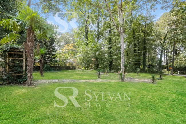 Building Photo - Turn the key. Enter. Smile. Repeat every day!