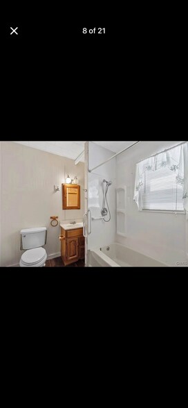 Downstairs bathroom has had some upgrades since these photos were taken - 186 E Bridge St