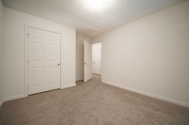 Building Photo - All Brick Building************Massive 2 Bedroom Villa************Single Level Villas