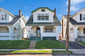 Building Photo - NORWOOD – Stunning Old-World Charm with Modern Comforts