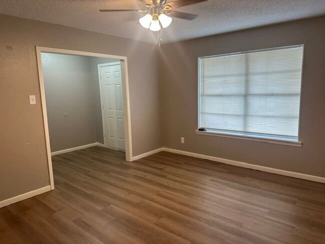 Building Photo - 4/1.5 PTISD Fenced yard and pet friendly