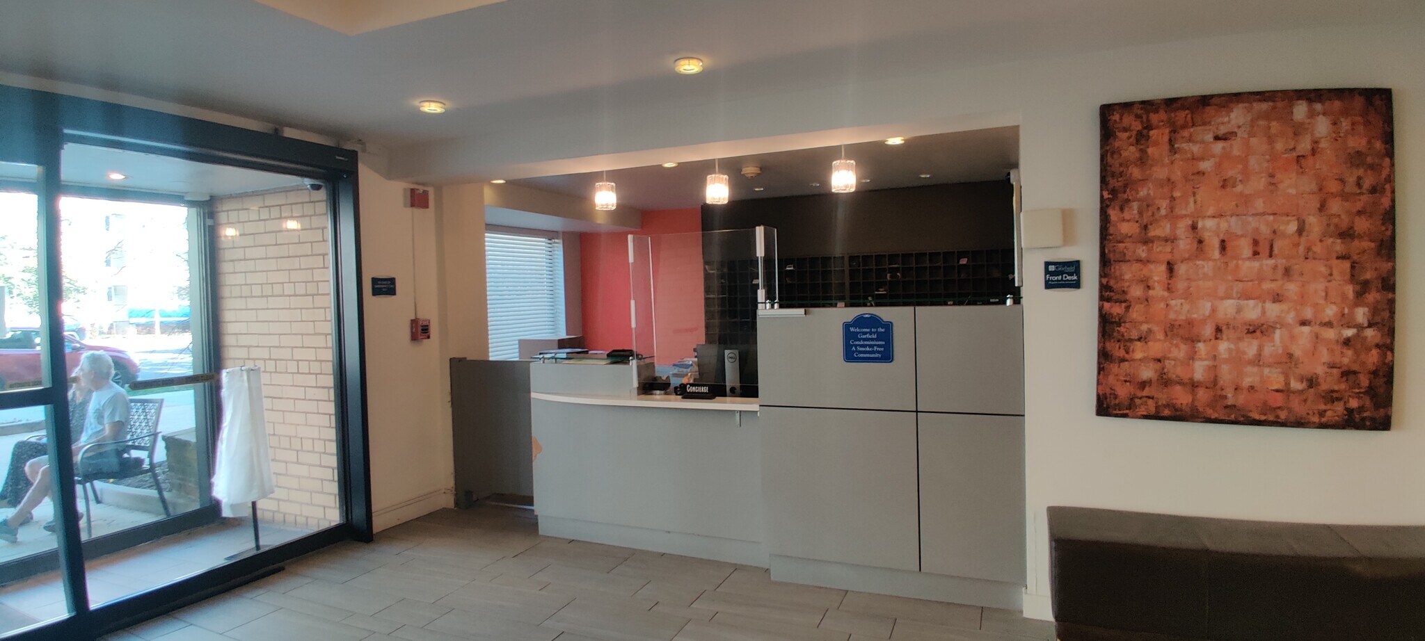 24/7 Consierge at the front desk. Can receive and annouce packages and other useful services - 5410 Connecticut Ave NW