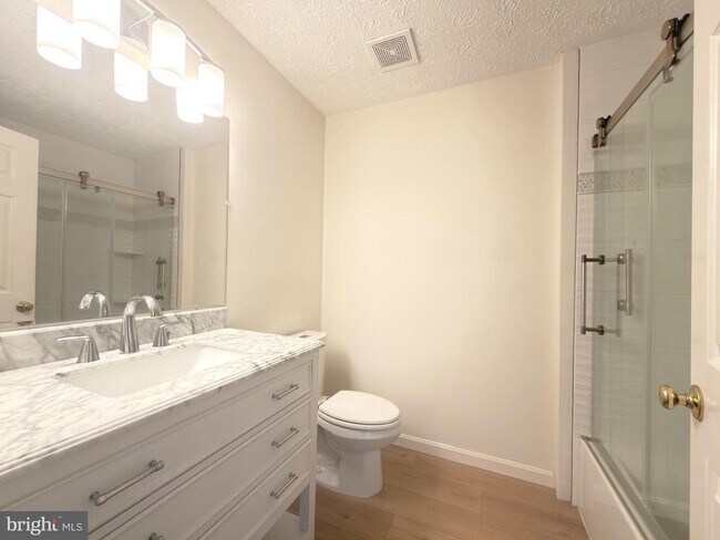 Building Photo - Welcome to Piney Orchard! This beautifully updated 2-bedroom, 2-bath condominium!
