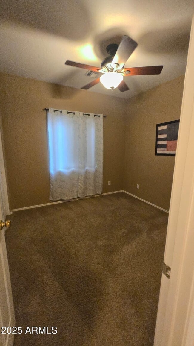 Building Photo - 4216 N 125th Ave