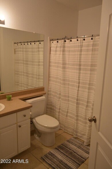 inside first bedroom bath room - 1701 E Colter St