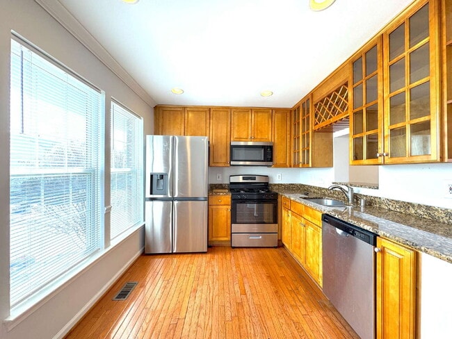 Building Photo - Inviting Suburban Retreat with Spacious Layout and Timeless Hardwood Flooring