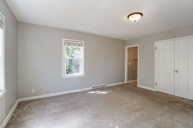 Building Photo - A Home With Character Walking Distance To ...