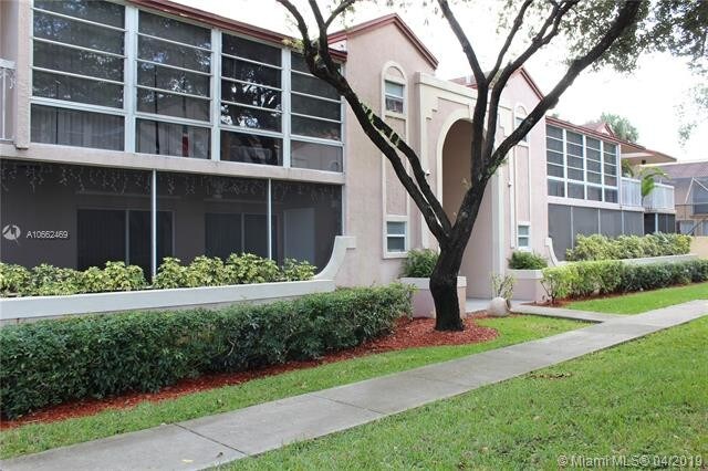 Building Photo - 4680 NW 102nd Ave  104-20