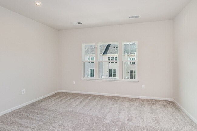 Building Photo - New Construction 3 Bedroom Townhome in Fre...