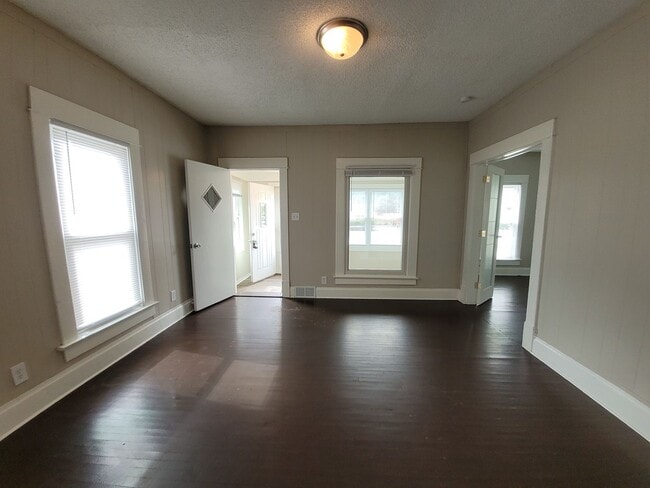 Building Photo - Two bedroom home with partially fenced yard!