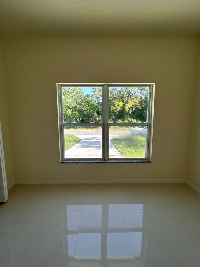 Building Photo - COZY COTTAGE 2/2 IN LAKE PLACID FL