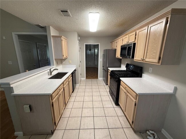 Building Photo - 3600 Patterstone Dr