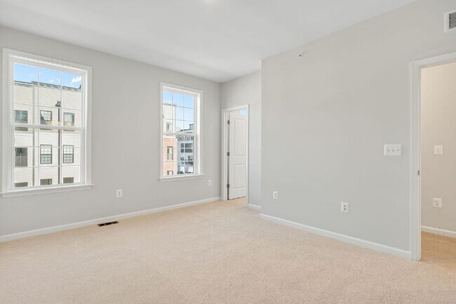 Building Photo - Brand-New 3 Bedroom Condo in Coalfield Station – $2,400/mo