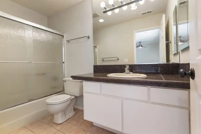 Building Photo - Upgraded La Costa Townhome