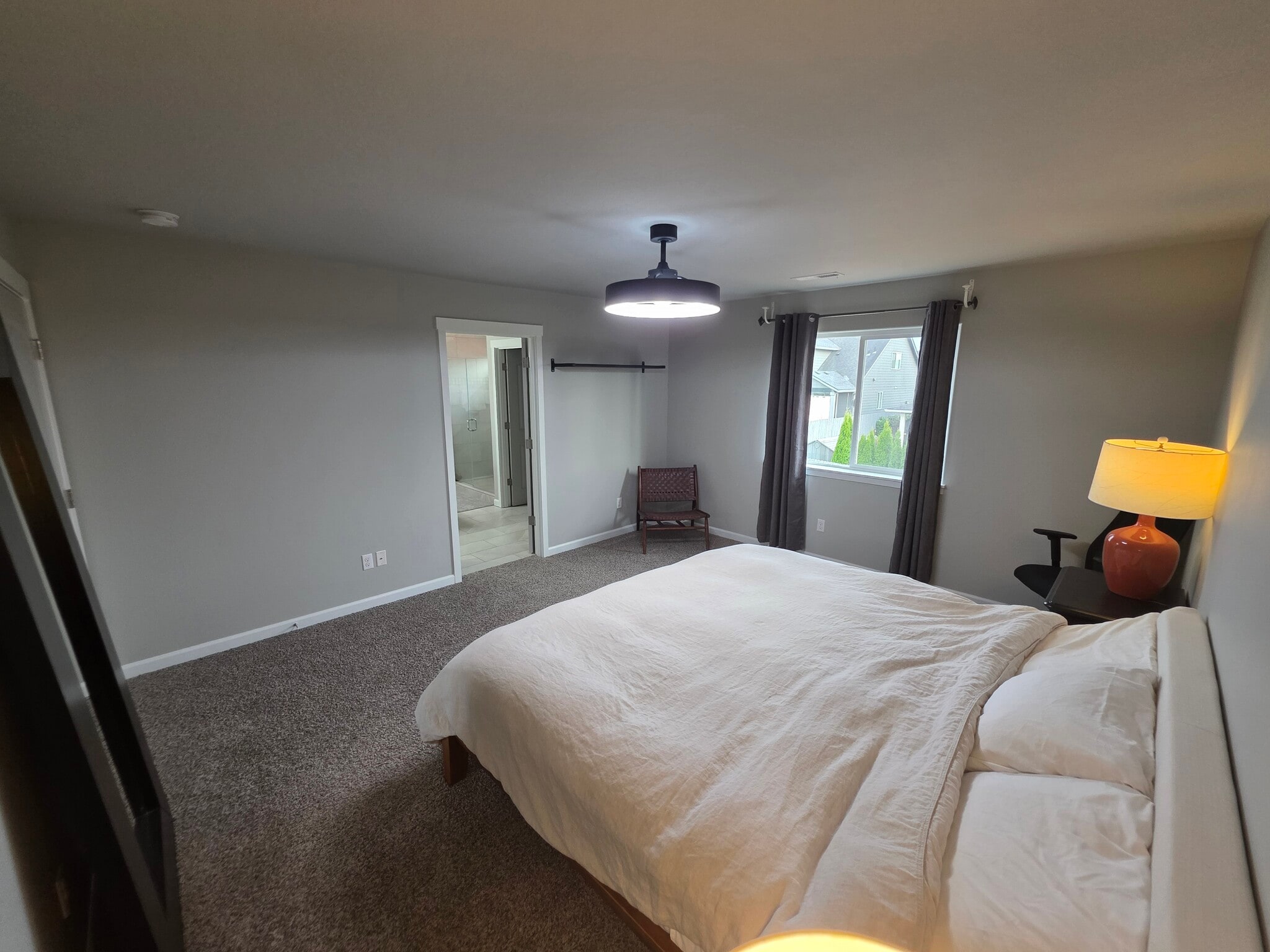 Private bedroom with a computer chair and a hidden foldable desk - 10721 NE 109th St