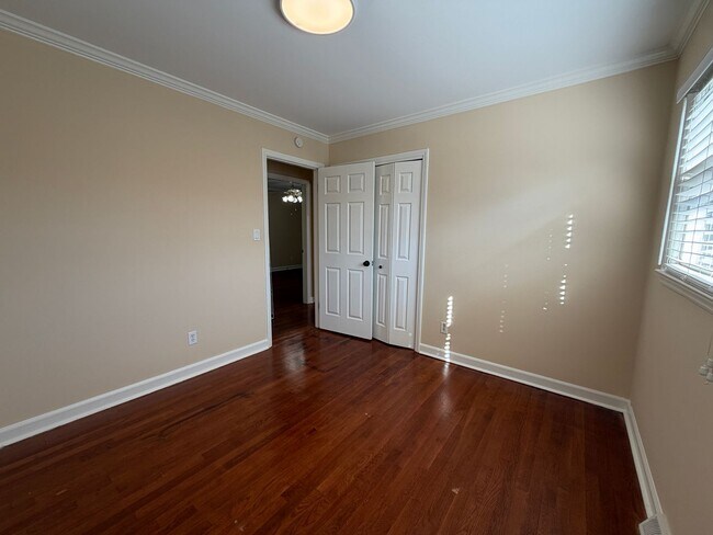 Building Photo - Freshly Painted Split-Level Home with Large Deck & Lawn Care Included