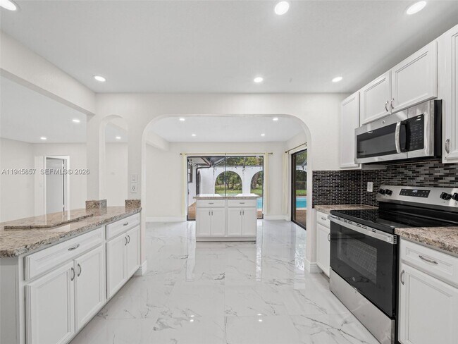 Building Photo - 10251 NW 39th Ct