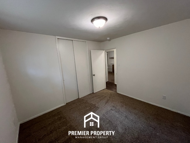 Building Photo - Spacious 3BR/2BA Home with Den & Living Room | Brick Fireplace & Large Yard