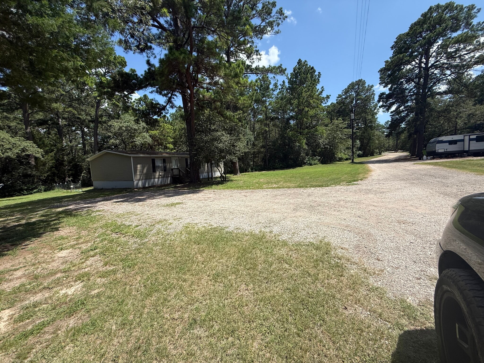 Entrance to property and driveway to house - 380 Pine Tree Loop