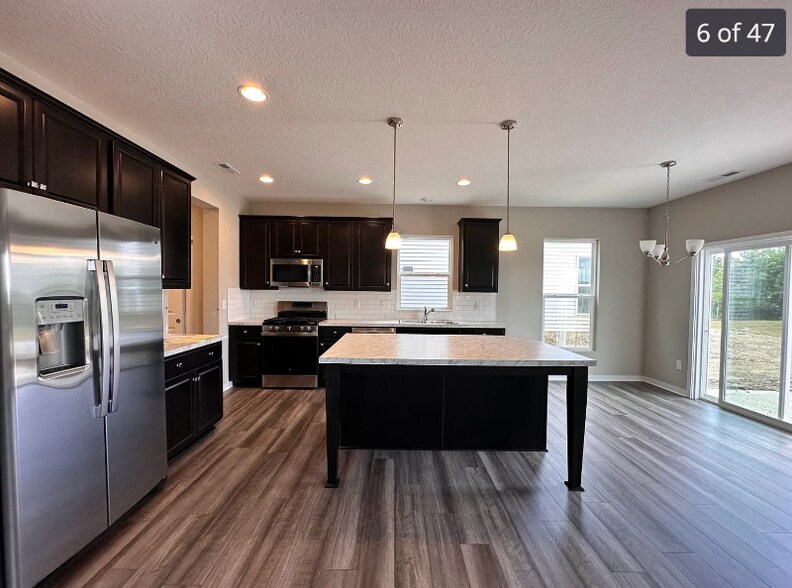 Building Photo - 7044 Unitas Loop