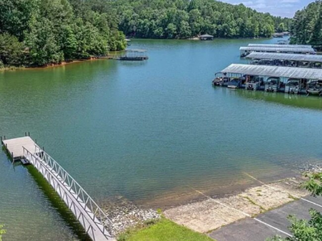 Building Photo - Beautiful and Spacious! Upgraded Multi-level Retreat with Lake Access, Golf, and Resort- Style Am...