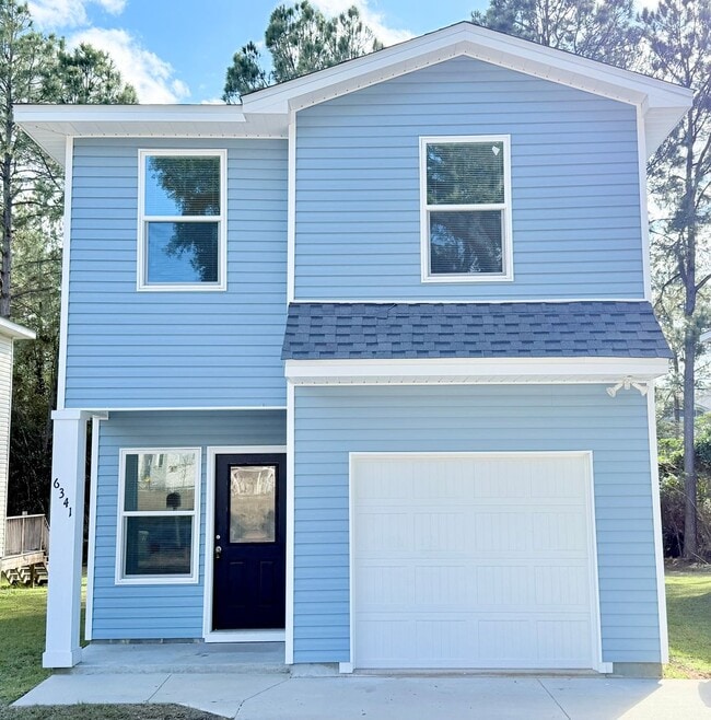 Building Photo - Spacious 4-Bedroom Home