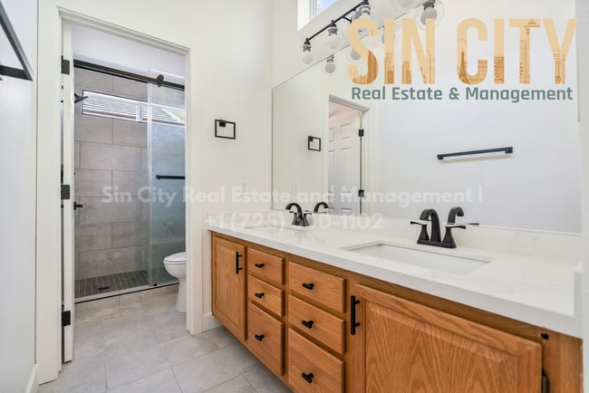 Building Photo - "Charming 3-Bed Oasis with Granite Touches & Cozy Fireplace in Las Vegas"