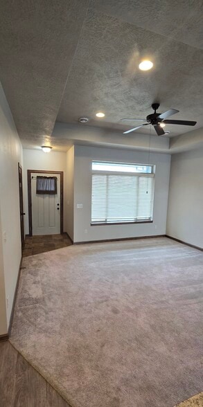 Living Room, Large Picture Window with Transom. - 3511 E Bison Trl