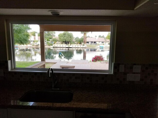 Building Photo - AVAILABLE NOW IN THE SPRINGS ON THE LAKE I...