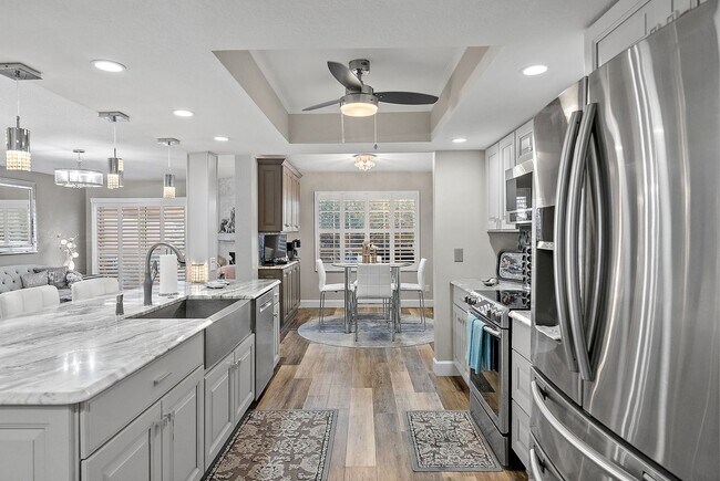 Building Photo - Two Bedroom/Two and a half bath gated townhome.