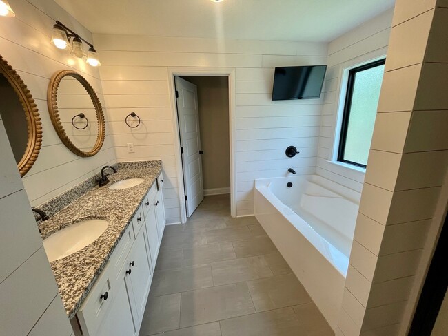 Building Photo - Whispering Pines 4 Bedroom 3.5 Bathroom Re...