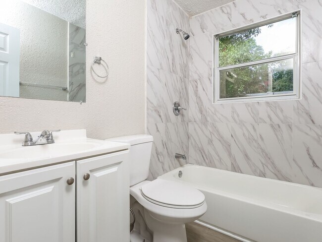 Building Photo - 3 BR/1BA | Newly Renovated Single Family Home | Screened in Patio and carpot | Huge backyard!