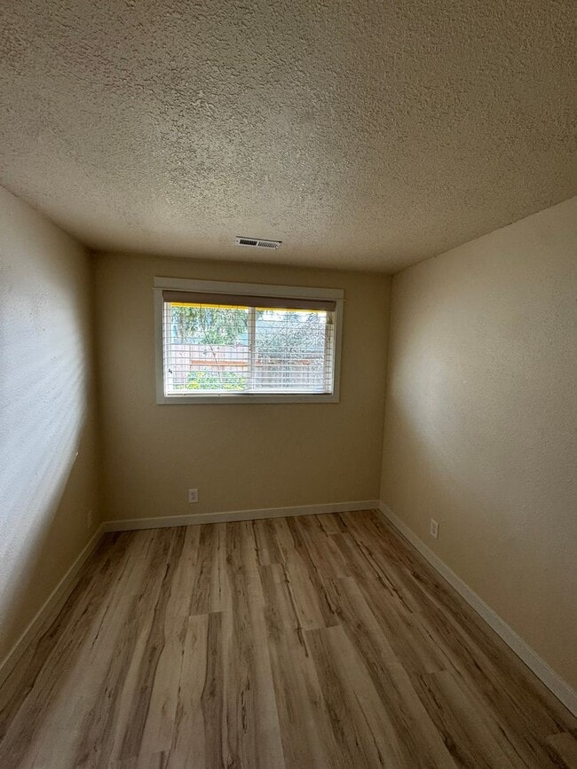 Building Photo - Charming 3 Bedroom Home with Beautiful Backyard & RV Parking