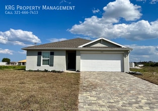 Building Photo - 7009 Blue Cypress Way