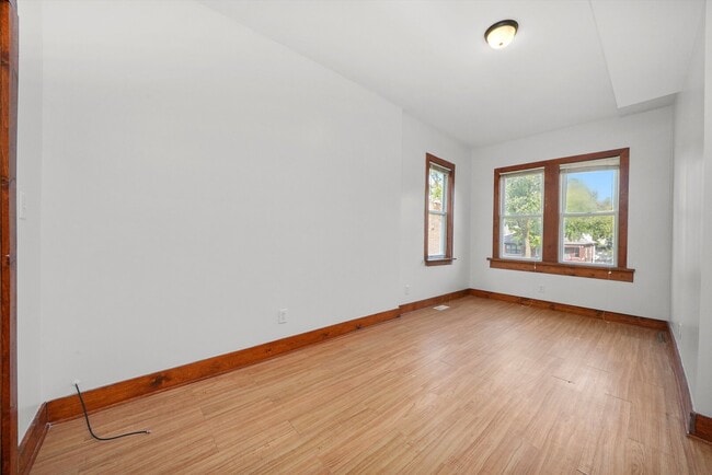 Building Photo - 6540 S Vernon Ave