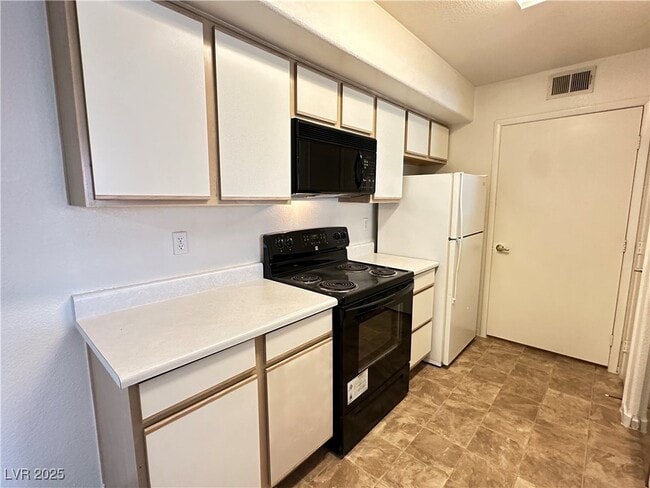 Building Photo - 2300 E Silverado Ranch Blvd