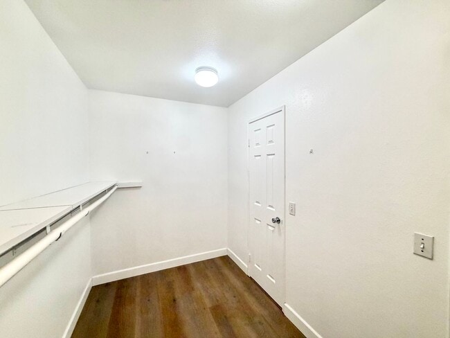 Building Photo - Spacious 5 Bedroom Home with 3 Car Garage & Primary Suite Balcony