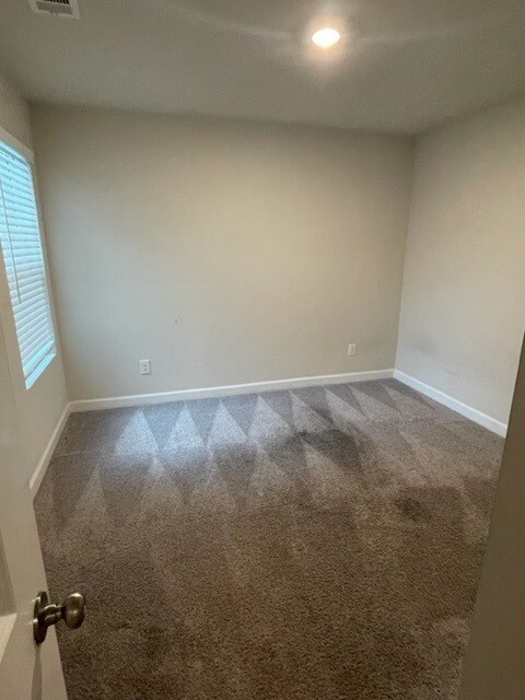 Building Photo - Almost new town home available now!