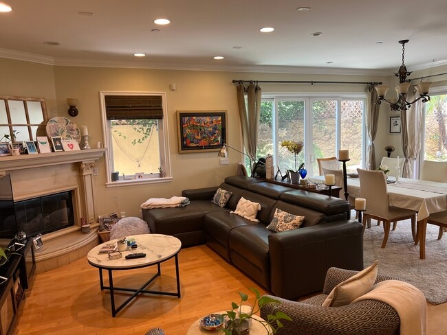 Open living room dining room - 1540 S Bentley Ave