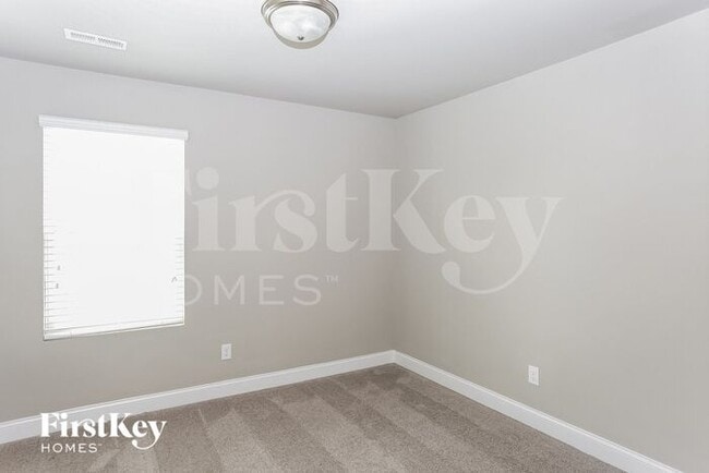 Building Photo - 9022 Evans Woods Dr