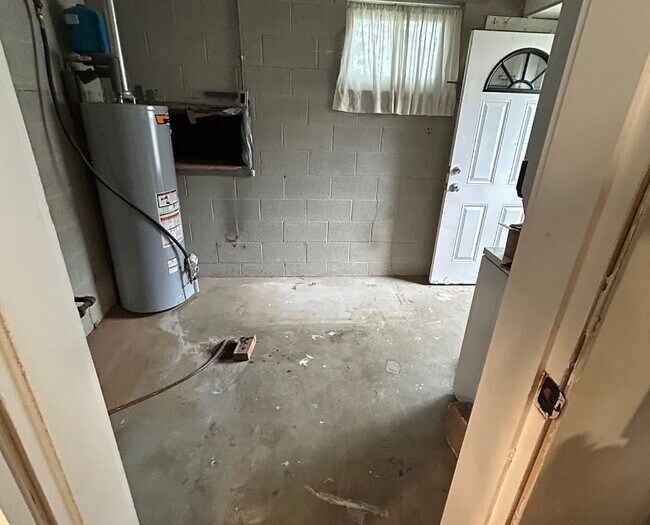 Utility room washer dryer area - 1909 Menard Dr