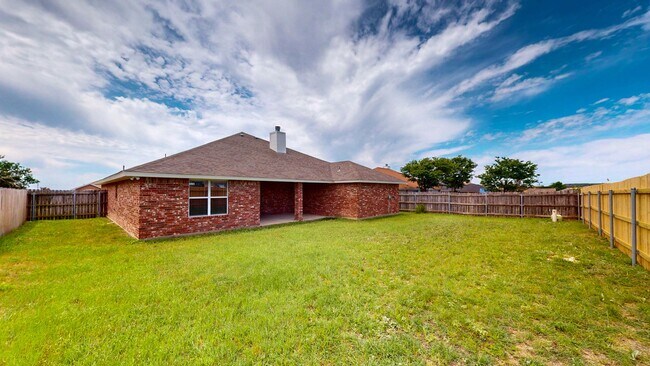 Building Photo - Charming 4-Bedroom Spacious Full-Brick Home with Modern Updates