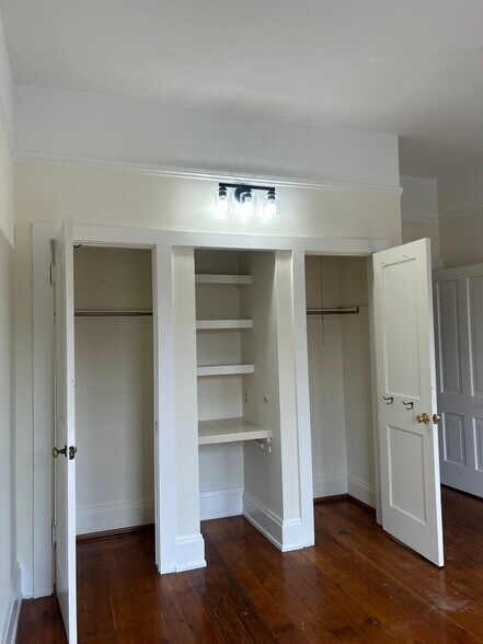 Front bedroom with two lighted closets and small vanity - 611 S 3rd St