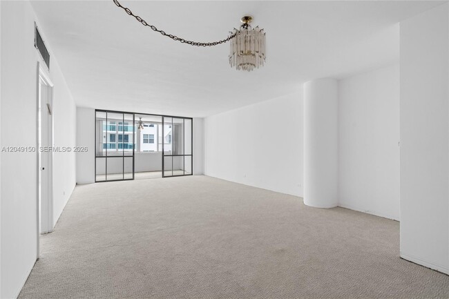 Building Photo - 5005 Collins Ave