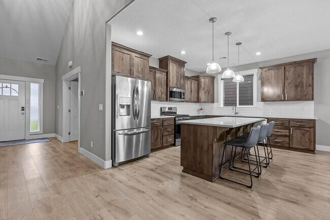 Building Photo - Modern 4BD/3BA Rental with Garage & Fenced...