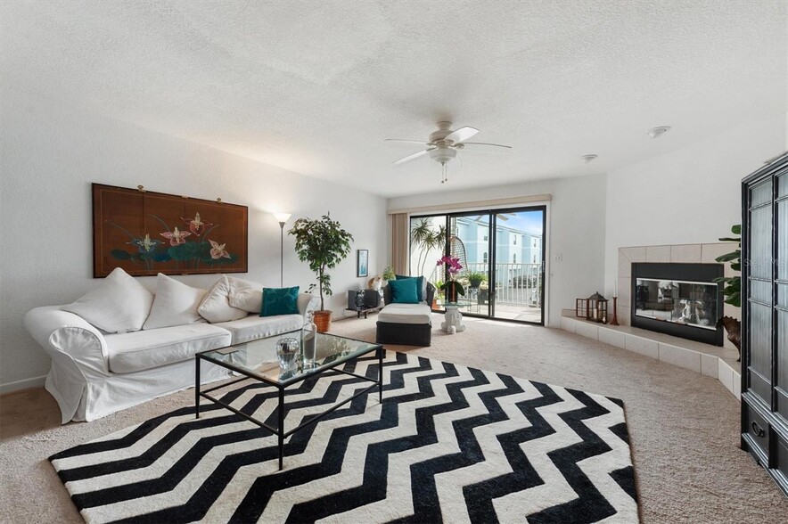 Living room facing balcony - 745 Pinellas Bayway S